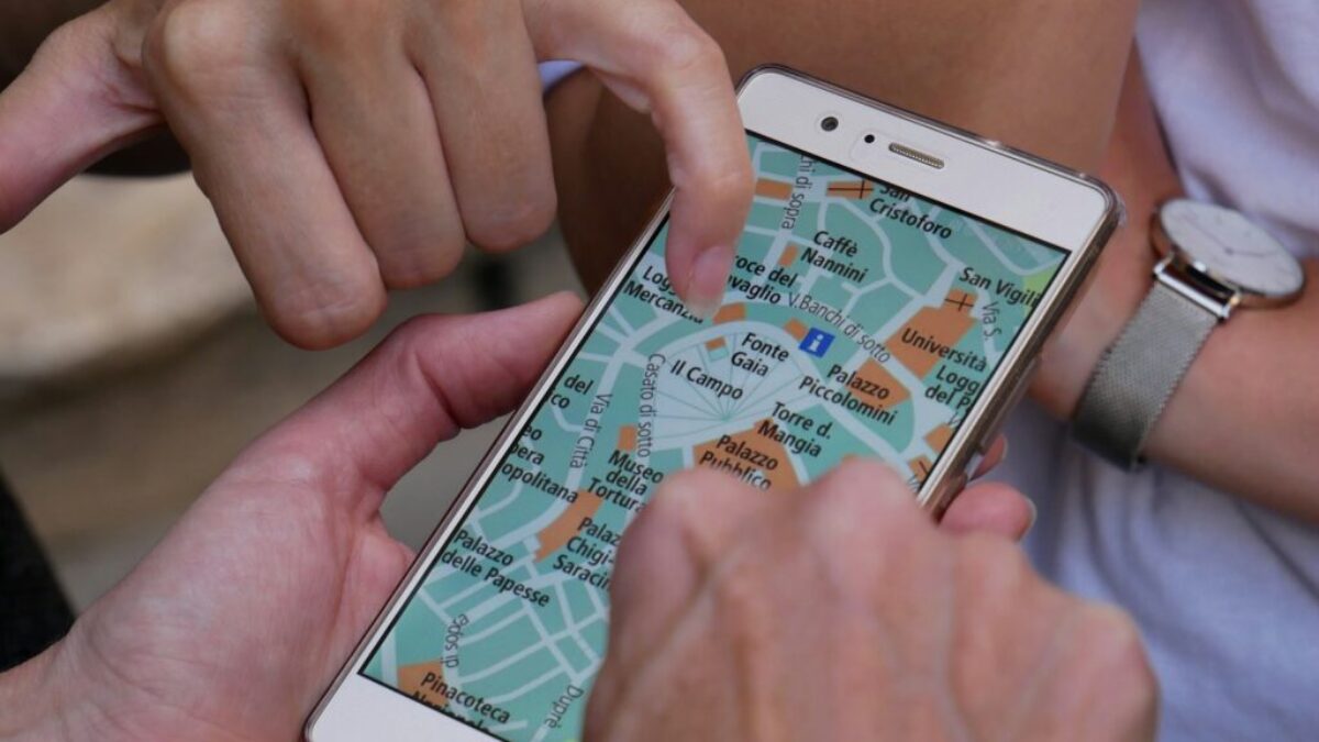 person touching smartphone