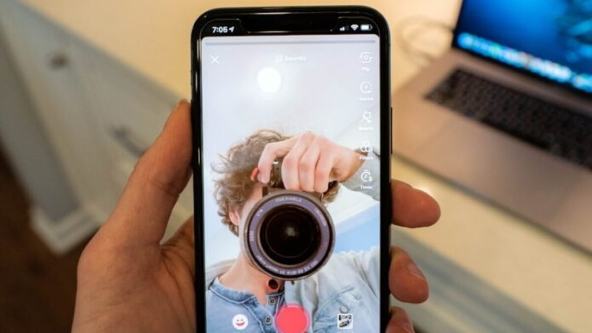 person holding black android smartphone