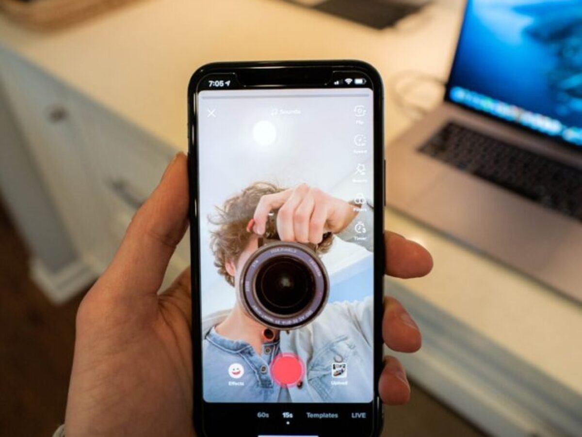 person holding black android smartphone