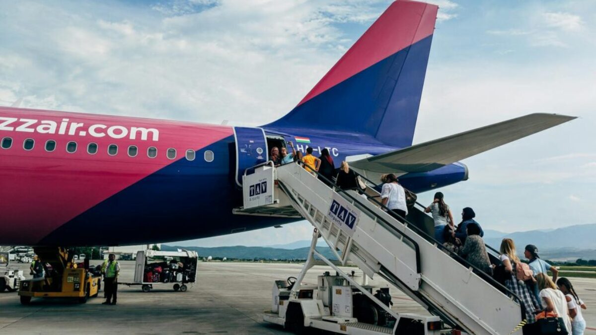 People Walking Inside Airline