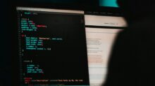 flat screen computer monitor displaying white and black screen