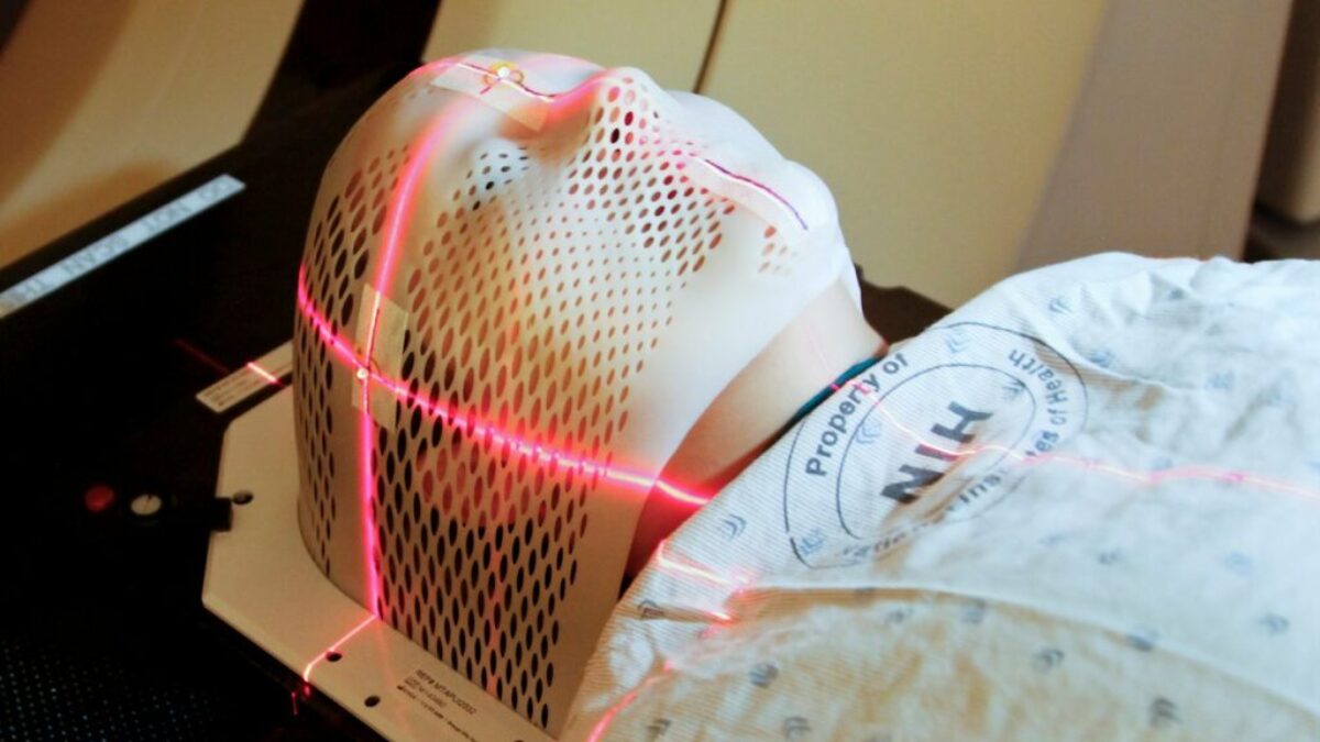 person lying inside MRI machine