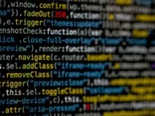 yellow and blue data code displayed on screen