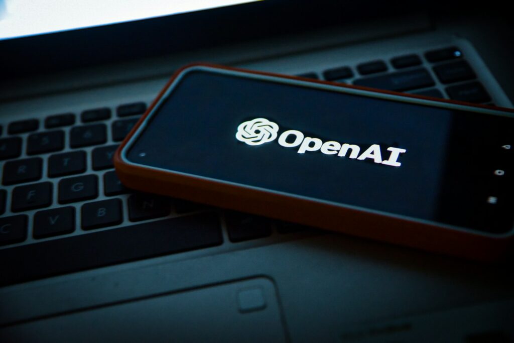 Photo by Levart_Photographer - Techsvět a cell phone sitting on top of a laptop computer