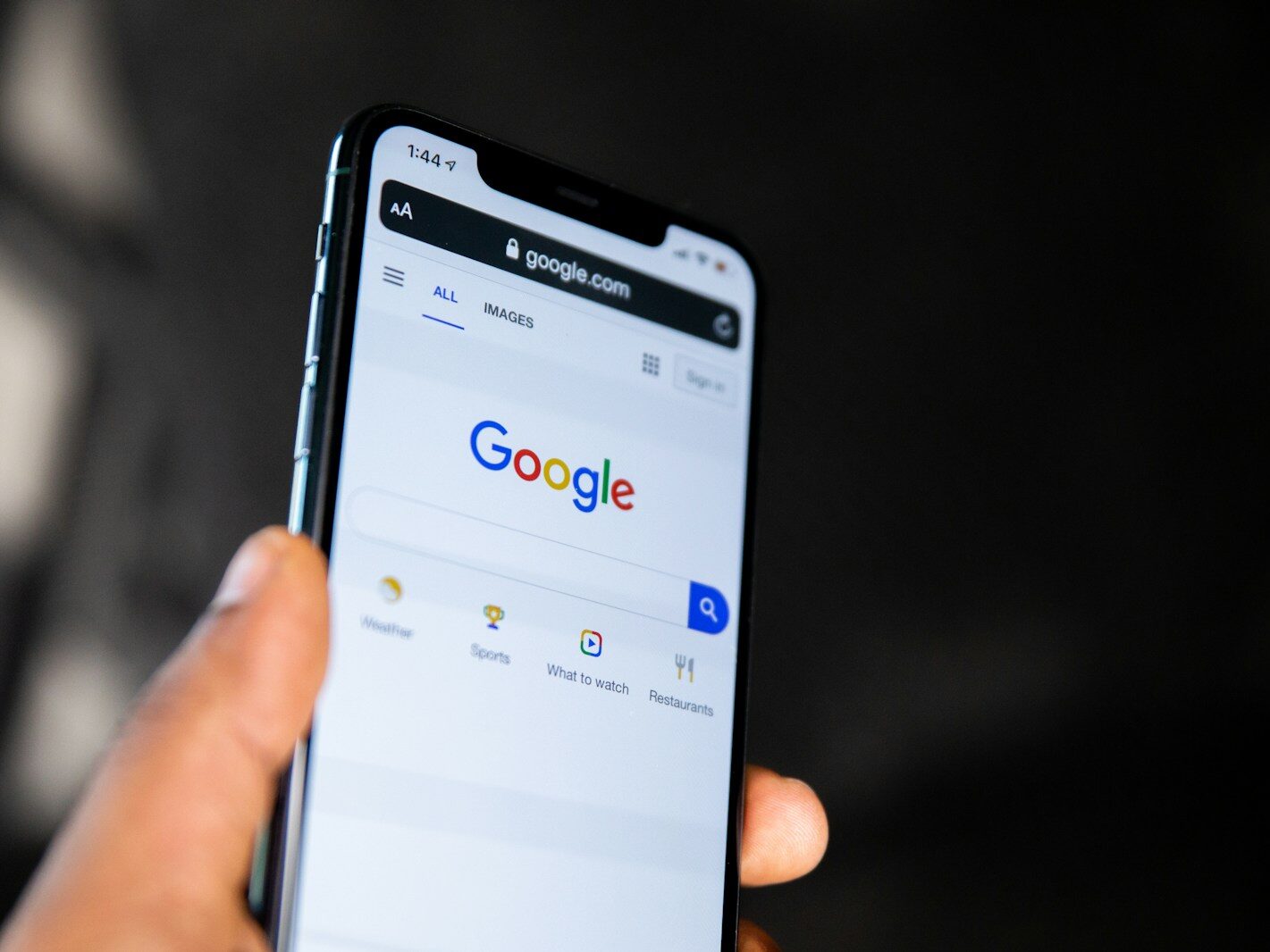 person holding black android smartphone