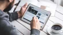 Man using stylus pen for touching the digital tablet screen