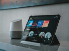 black tablet computer on white table