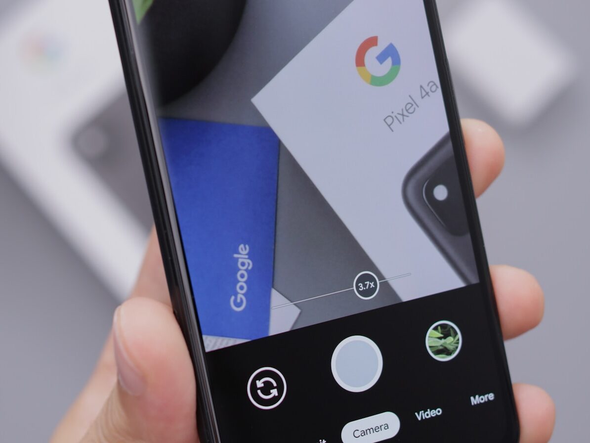 black and white smartphone displaying google search