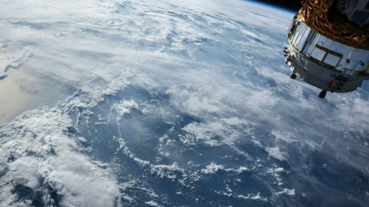 view of Earth and satellite