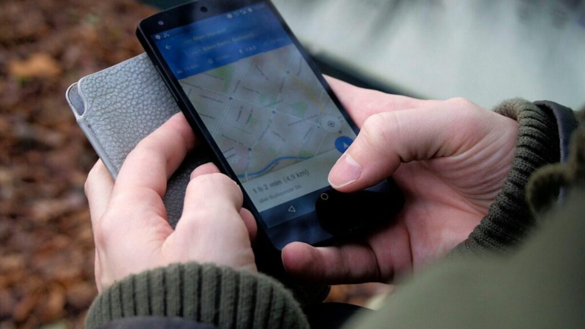 Person Using Google Maps Application Through Black Android Smartphone