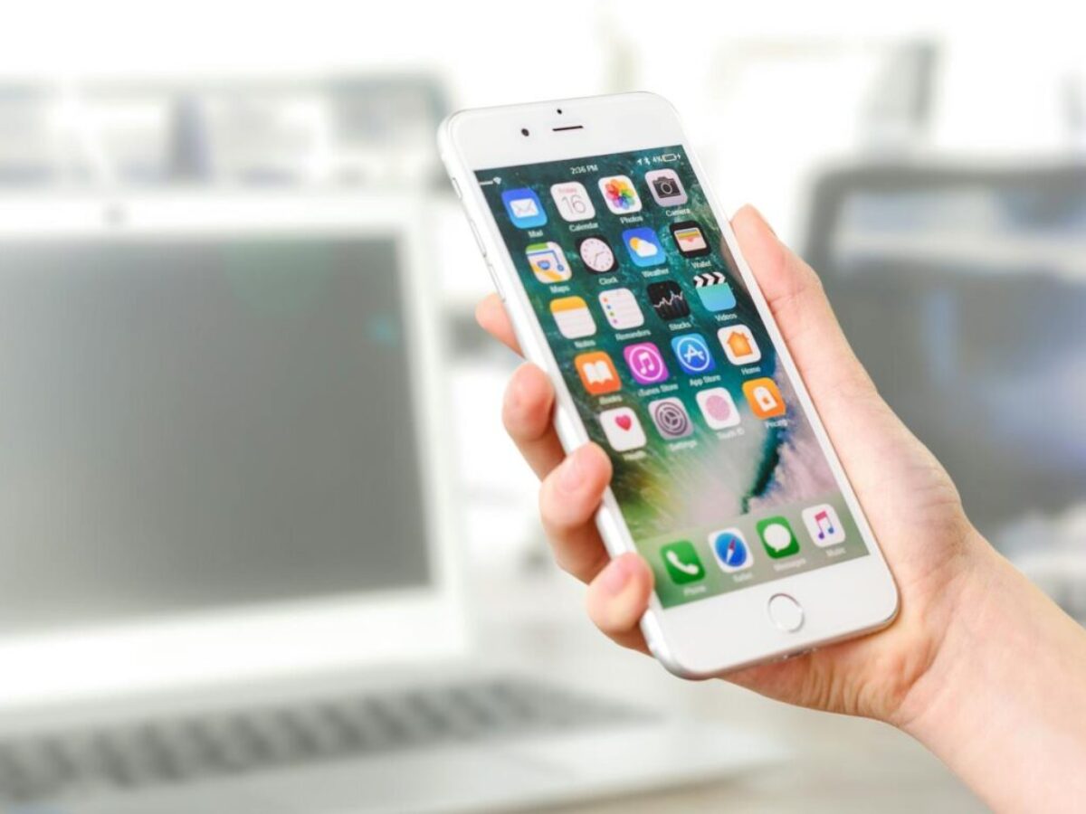 Person Holding Silver Iphone 7