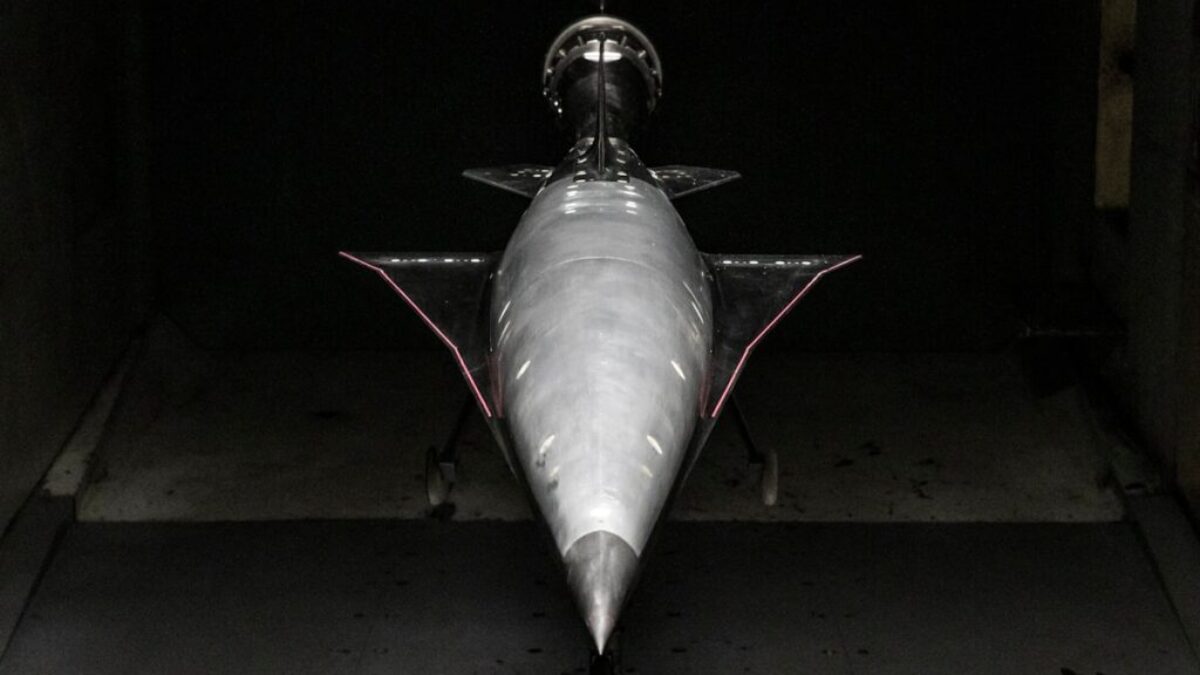 an airplane is shown in a dark room