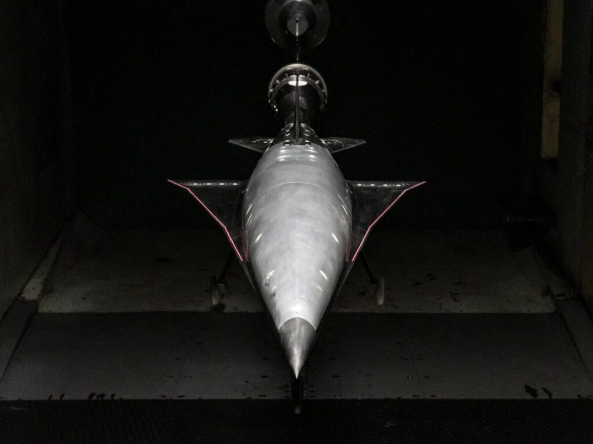 an airplane is shown in a dark room