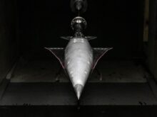 an airplane is shown in a dark room