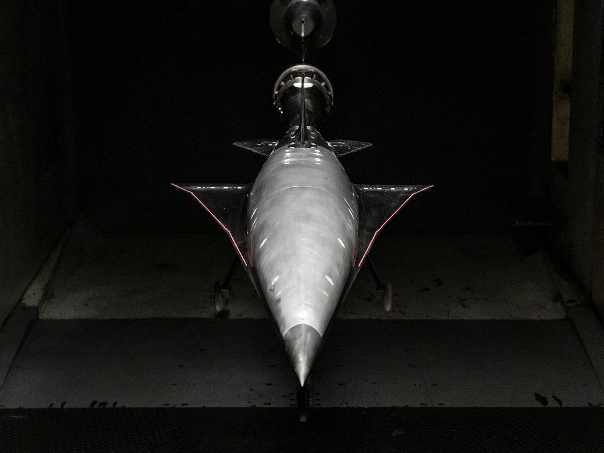 an airplane is shown in a dark room