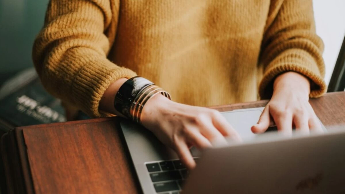 person using laptop computer