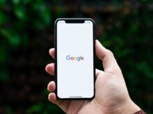 person holding black android smartphone