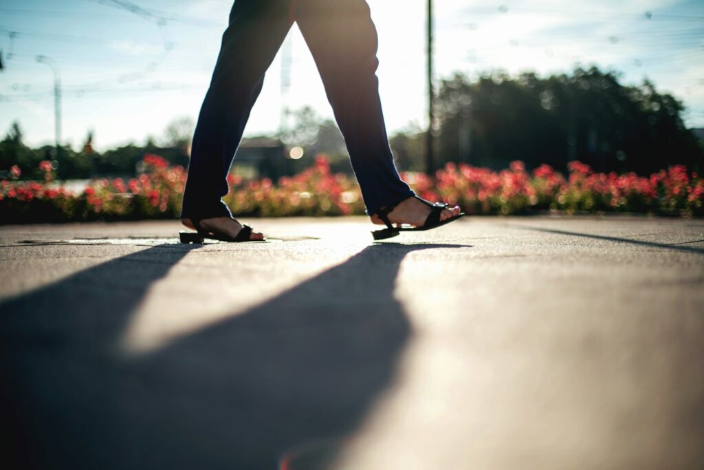 - Techsvět person walking on walkway during daytime