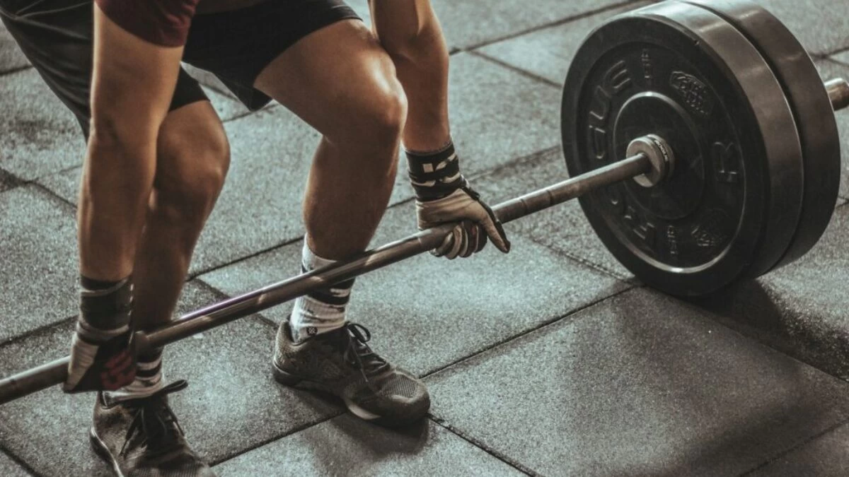 person weightlifting painting