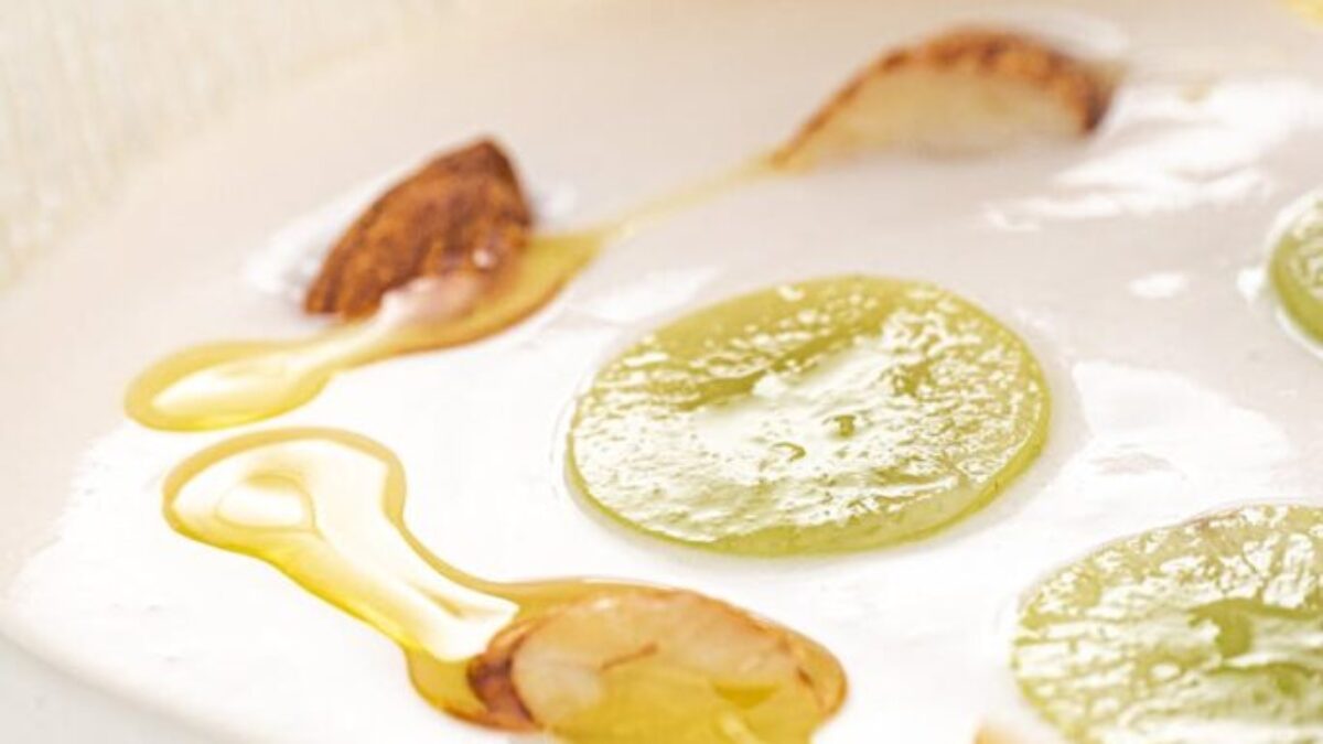 Fruit Pieces and Honey in Bowl of Yogurt