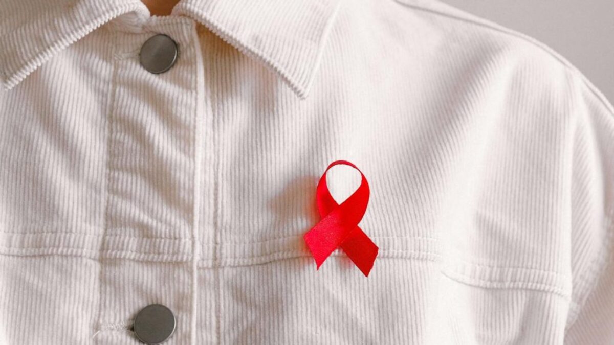 Man Wearing Red Ribbon