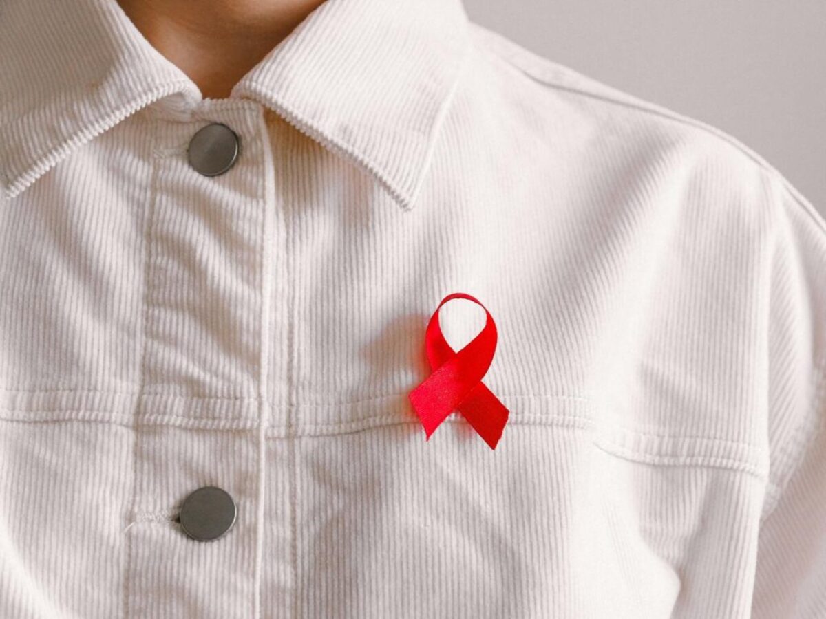 Man Wearing Red Ribbon