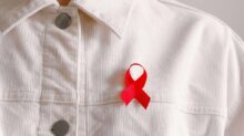 Man Wearing Red Ribbon
