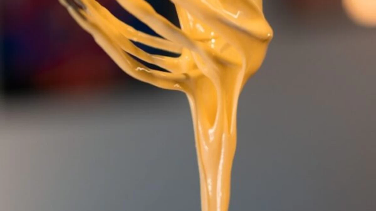 yellow pasta on white ceramic bowl