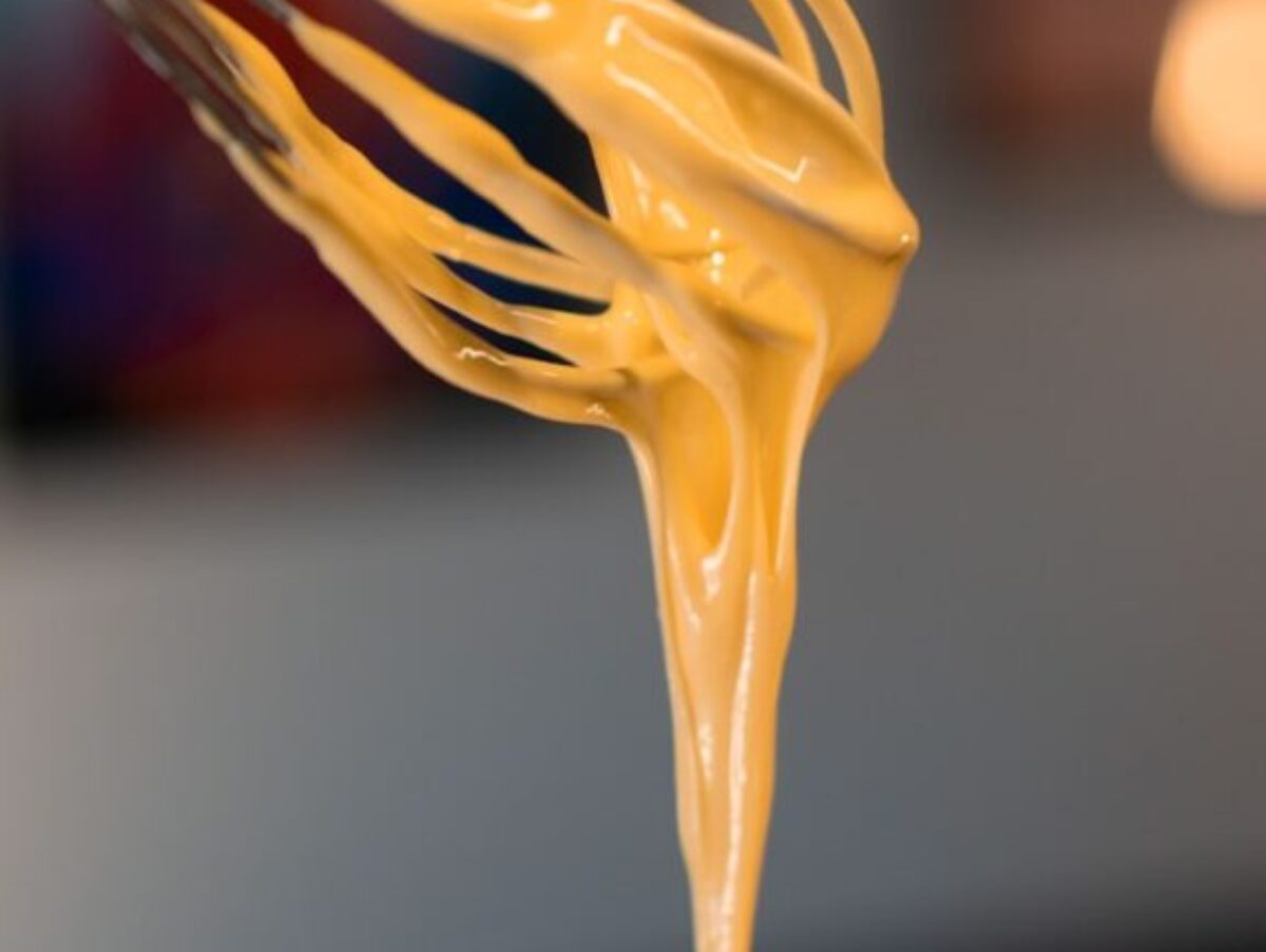 yellow pasta on white ceramic bowl