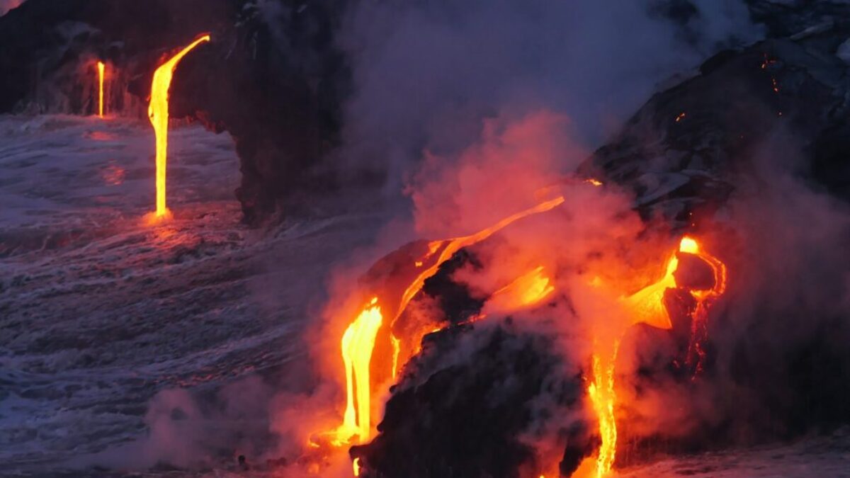 photo of lava flowing on land