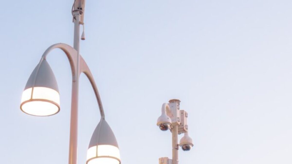 a couple of street lights sitting next to each other