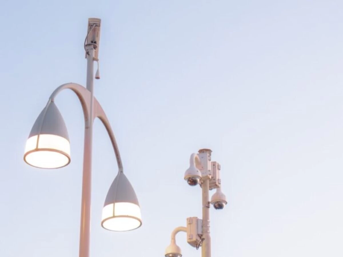 a couple of street lights sitting next to each other