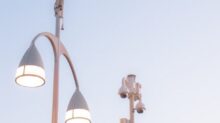 a couple of street lights sitting next to each other