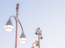 a couple of street lights sitting next to each other