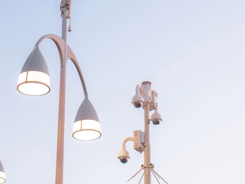 a couple of street lights sitting next to each other