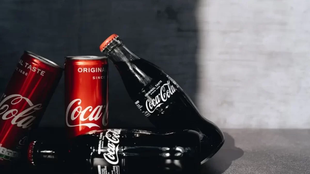 Close-Up Photo Of Canned And Bottled Soft Drinks