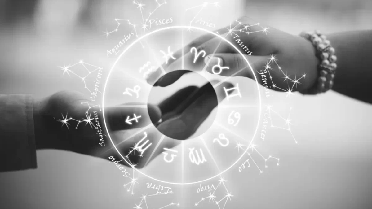 horoskop, muž a žena se chytají za ruku