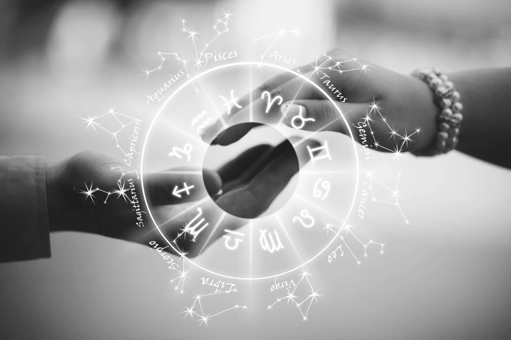 horoskop, muž a žena se chytají za ruku