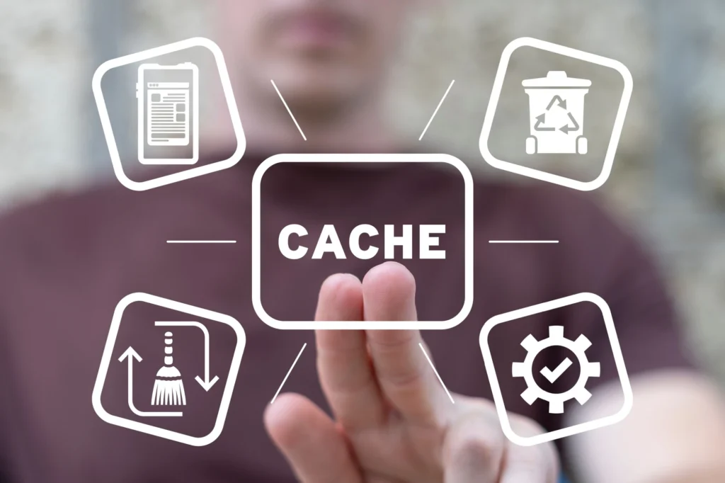 muž mačká na tlačítko "cache" - demonstruje nutnost čištění dočasných souborů