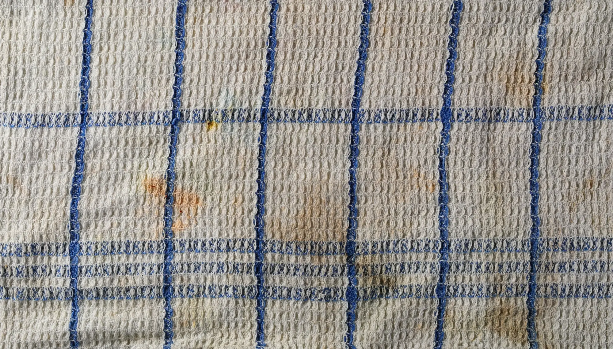 Skvrny před praním v pračce nechte odmočit - Techsvět Špinavá kuchyňská utěrka