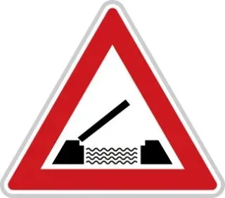 Dopravní značka v trojúhelníku.