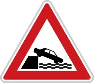 Výstražná dopravní značka. 