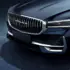 Close-up of a dark blue car front with a chrome, VOLGA grille, sharp LED headlights, and a black bumper edge.