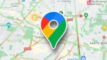 Google Maps pin centered on a city map with colored traffic lines (green, yellow, red) indicating road conditions.